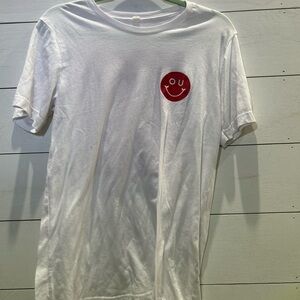 White T-Shirt with Red Smiley Patch
